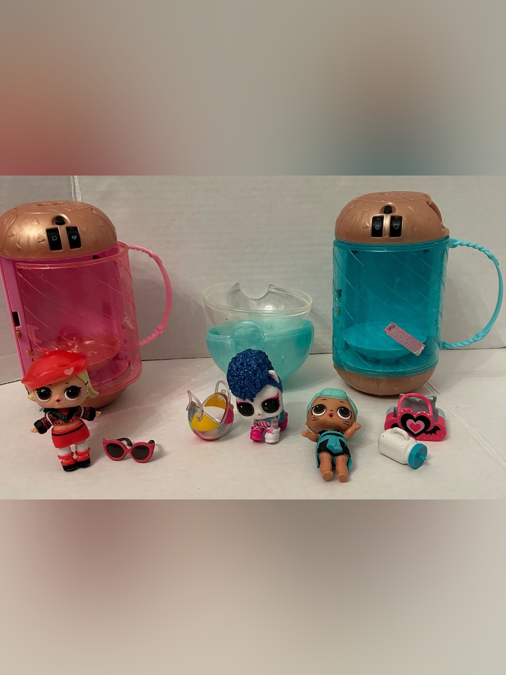 L.O.L. Surprise! Dolls Playset with Pink and Teal Carry Capsules